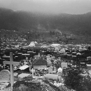 Cemetery overlooking a highland town